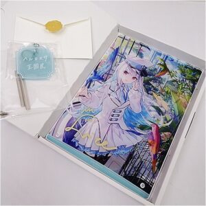 Open white box revealing a colorful anime artwork of a girl in a white outfit with blue hair, a bird nearby, inside a protective sleeve; envelope with a yellow wax seal sits beside and a blue-green tag in plastic adds context
