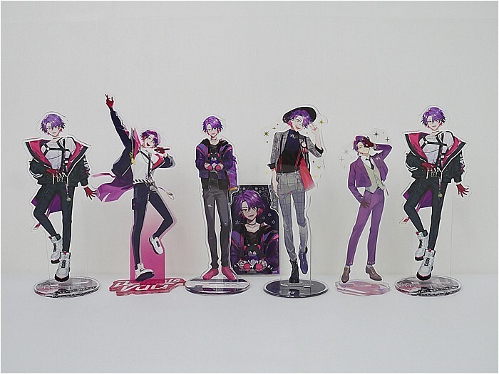 Seven purple-haired anime-style character standees in colorful outfits, posed in a line on clear bases.