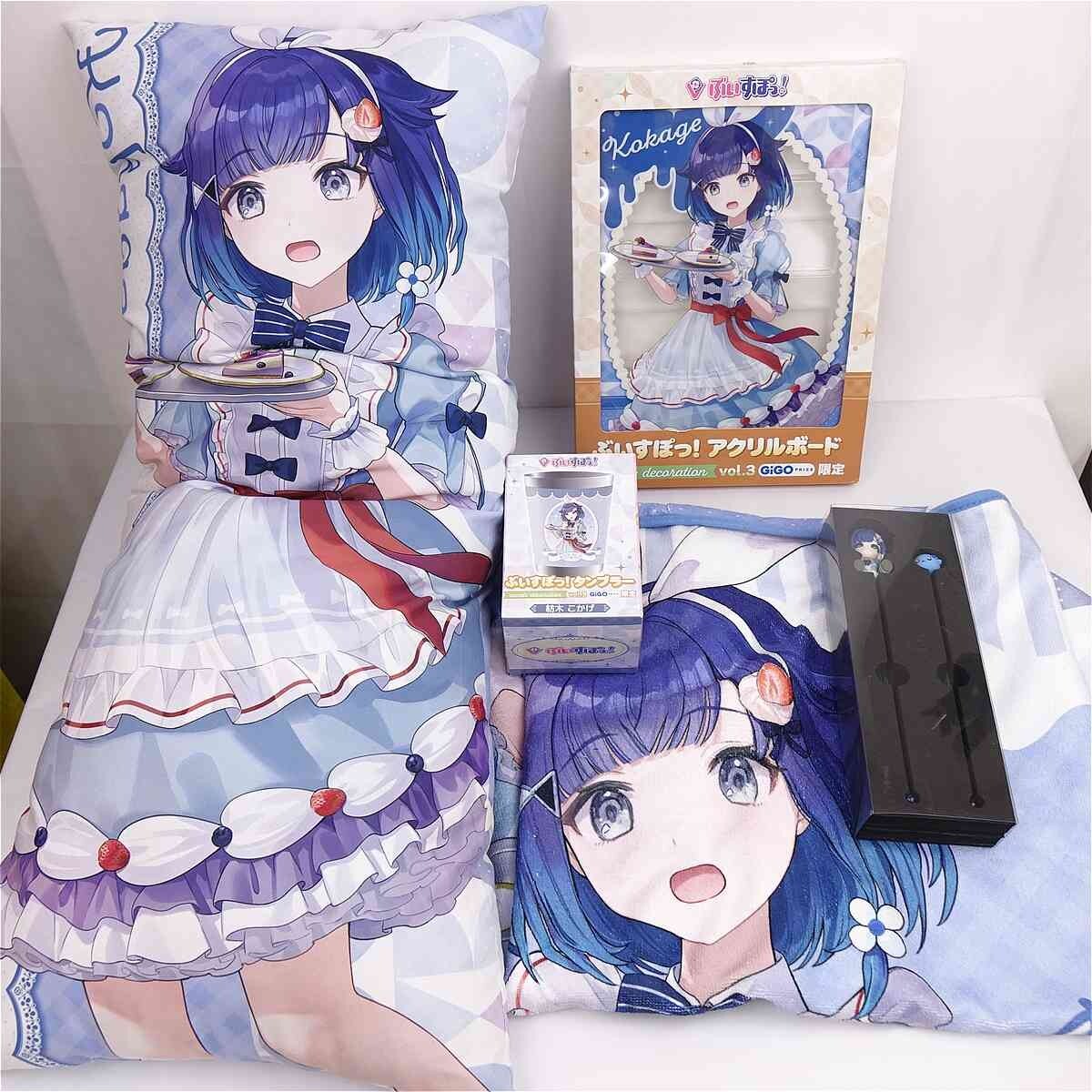 Anime-style bedding set featuring a blue-haired girl in a frilly dress holding a plate of cake, with matching pillow and packaging visible on a bed.