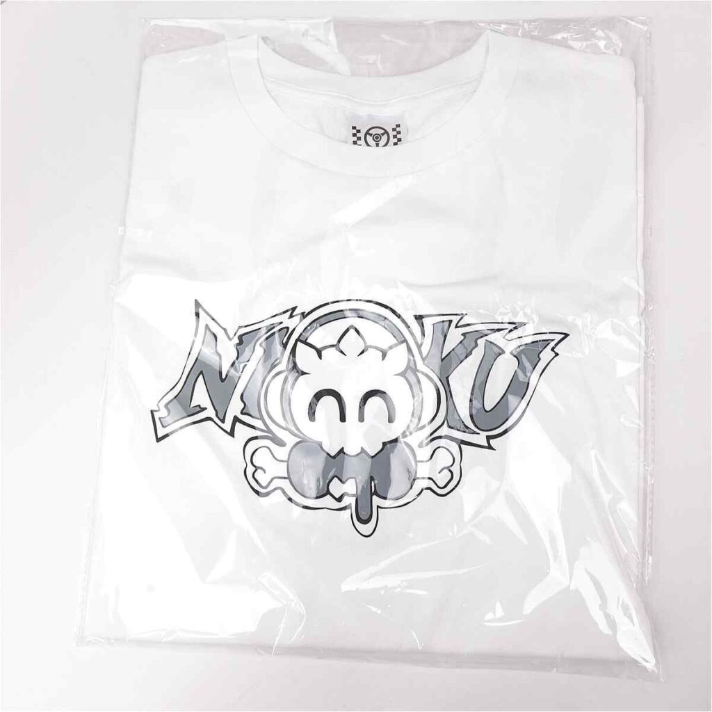 White T-shirt in clear packaging, featuring a cartoon cloud-face character with a tongue out and the stylized letters 'NOU'.