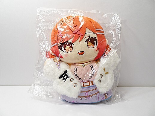 i-img518x388-17775381553260ysoskx19582 - Vtuberグッズ買取専門店Vtrader Anime-style plush doll with orange hair inside a clear plastic bag, wearing a pink and purple dress with a white fluffy jacket.