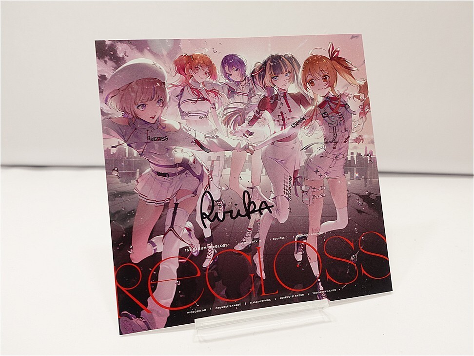 i-img972x729-17757055359189u7t8u2115259 - Vtuberグッズ買取専門店Vtrader Poster featuring five anime-style girls in matching pink outfits standing together, with bold red text across the bottom of the image.