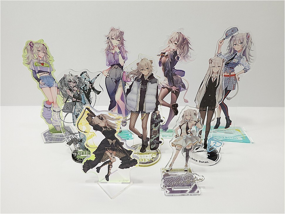 i-img972x729-17811489471694vbmfrd33419 1 | Vtuberグッズ買取専門店 Group of colorful anime character acrylic standees arranged on a white surface.