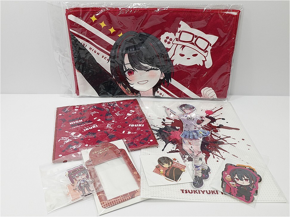 i-img972x729-17815093628936j2tzk21672 - Vtuberグッズ買取専門店Vtrader Assorted anime merchandise on a white surface: a red tote bag with a girl illustration, folders, stickers, and character cards.