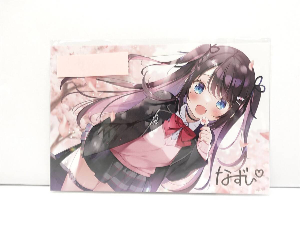 Cheerful anime girl with long dark hair and blue eyes in a pink cardigan and black jacket, holding a flower with a cherry blossom background.